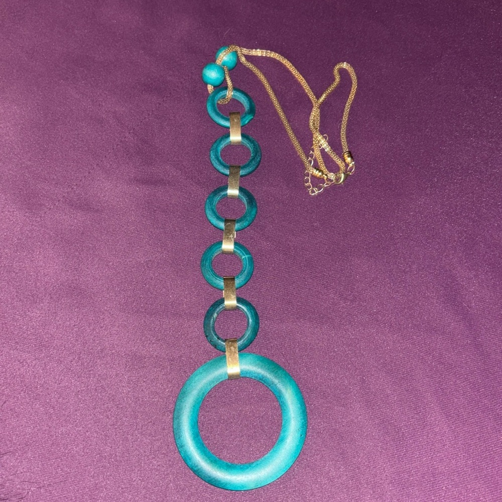 Long vintage teal circled necklace.